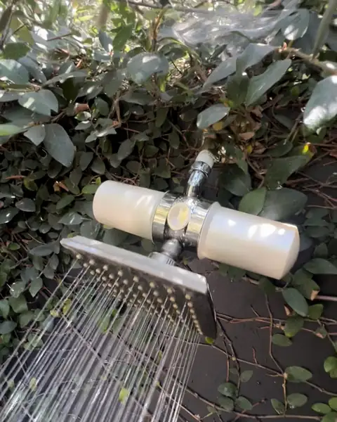 Pristine shower filter running outdoors